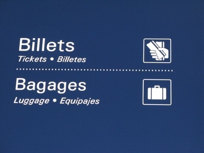 Transportkosten für das Golfbag blaues Schild mit baggage