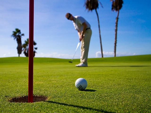 Golfspieler auf dem Green